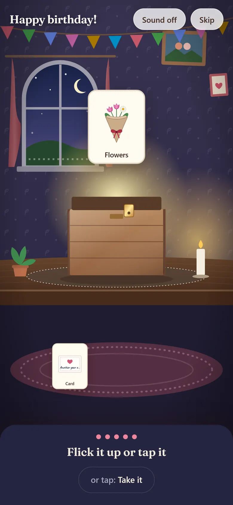 A birthday gift being unwrapped: a bouquet rises out of the glowing wooden crate, a card already lies next to it