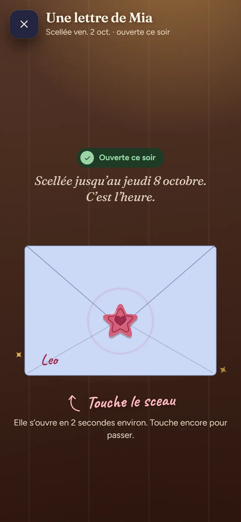 Une lettre scellée de Mia avec un sceau étoile rouge : touche le sceau pour l’ouvrir